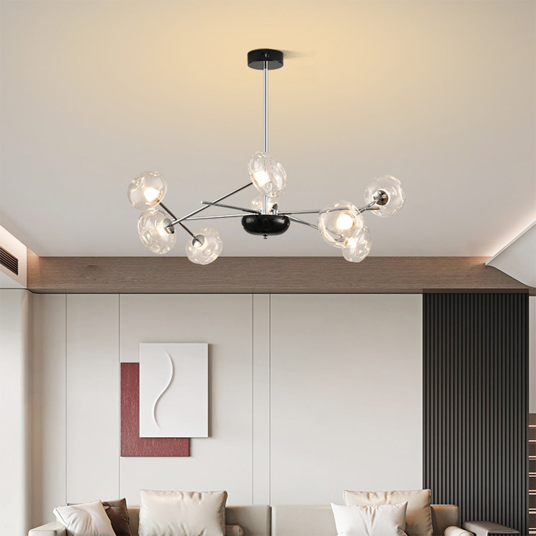Contemporary LED chandelier lights installed in luxury dining room creating sophisticated atmosphere