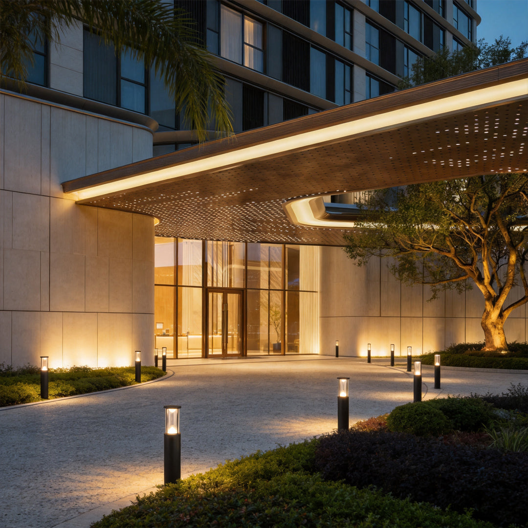 Luxury outdoor entrance featuring contemporary Landscape Bollard Lights along a modern driveway and covered entryway.