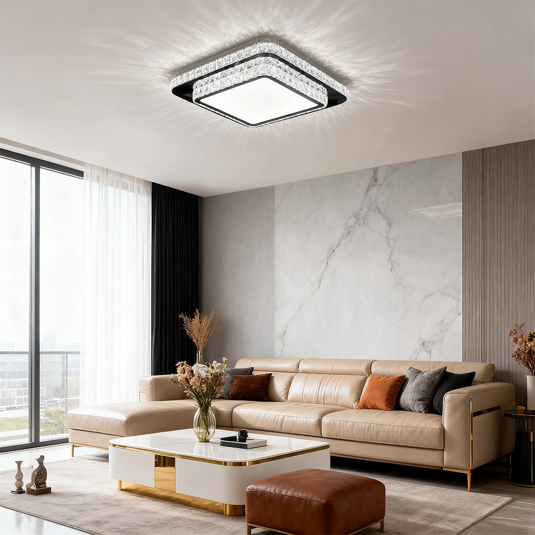 Square flush mount crystal light fixture brightening a luxury open-plan living room.
