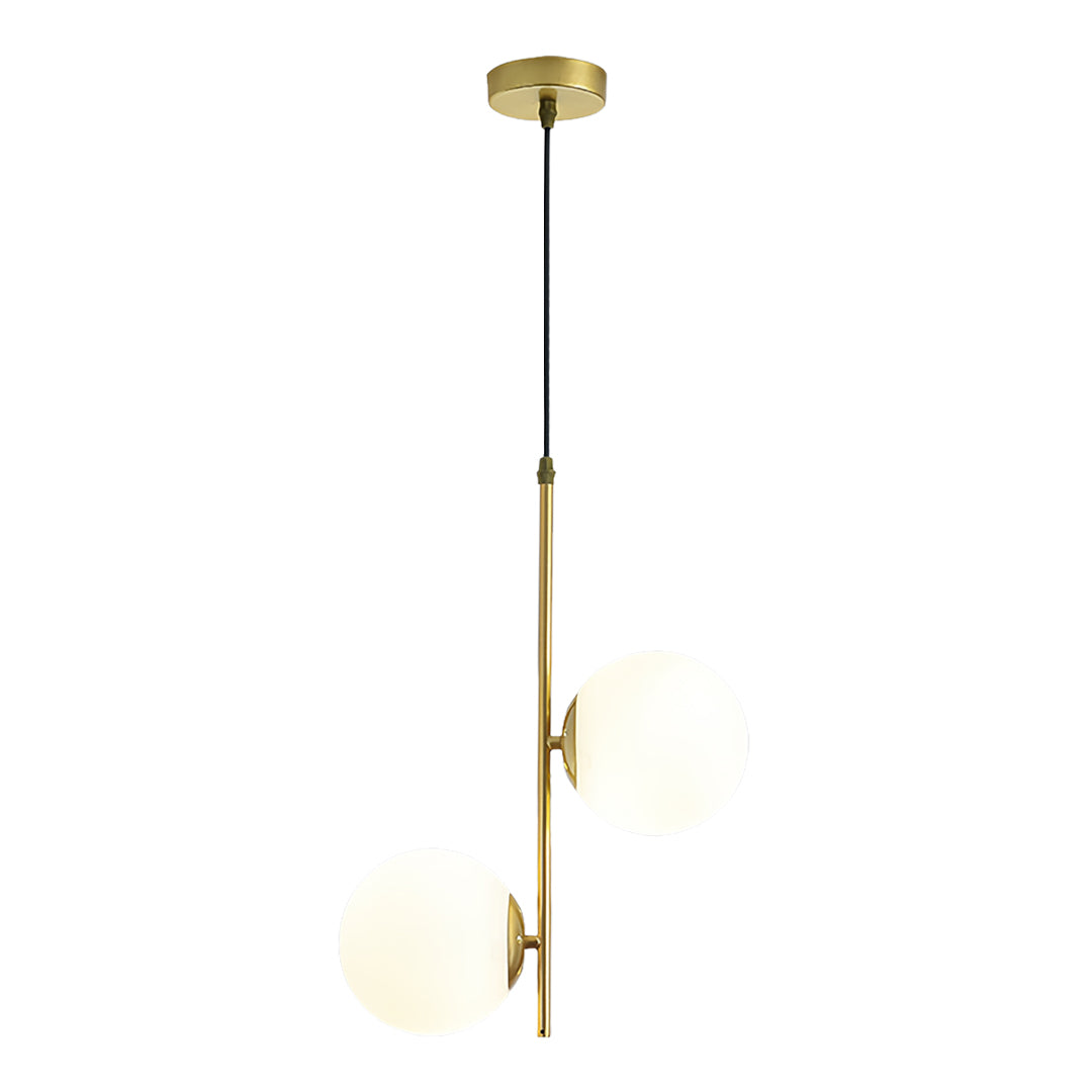 Luxury glass hanging pendant light with gold finish and clear sphere creating warm ambient illumination