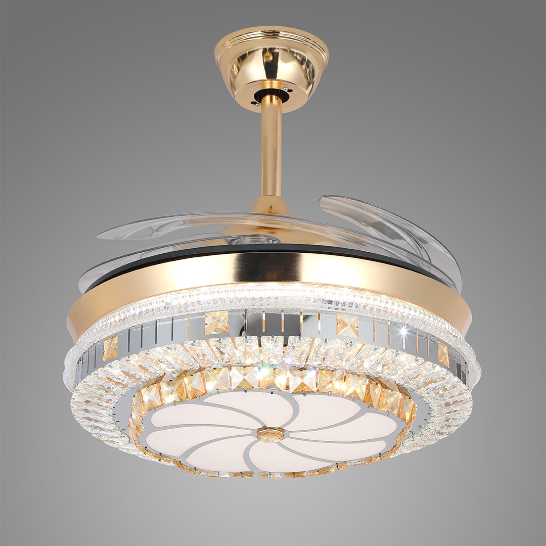 Luxury gold ceiling fan with light and detailed crystal drum on a solid background 