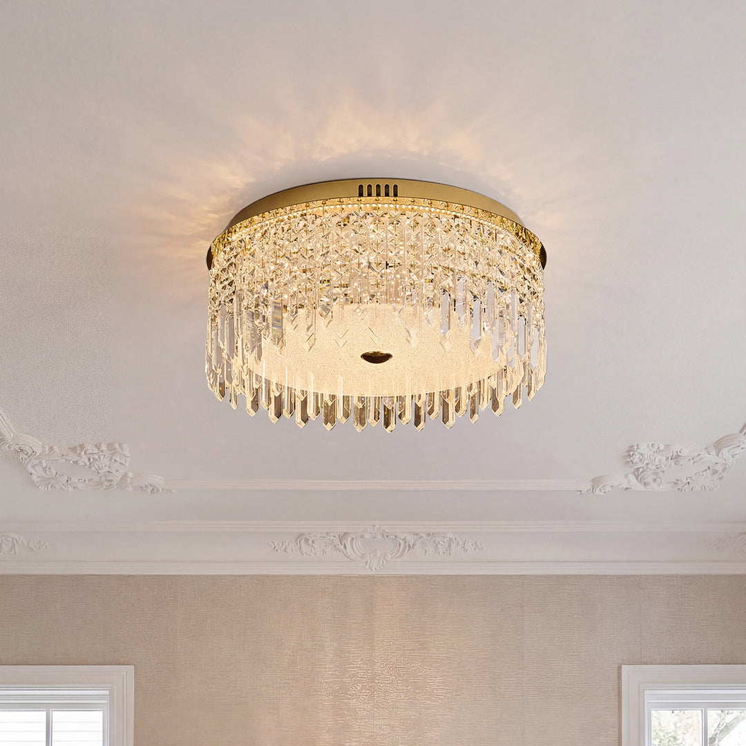 Luxury crystal ceiling lights flush mount with a gold base and cascading clear crystal drops.