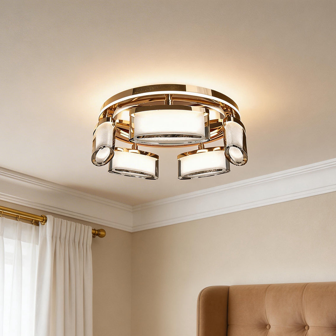 Luxury crystal flush mount ceiling light with gold rings and glowing rectangular shades.