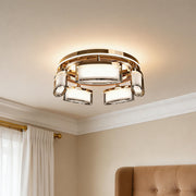 Luxury crystal flush mount ceiling light with gold rings and glowing rectangular shades.