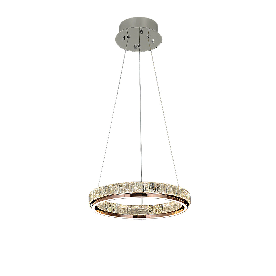 Luxury modern chandelier in a dark-themed living room with plush sofas, creating a cozy yet luxurious atmosphere.