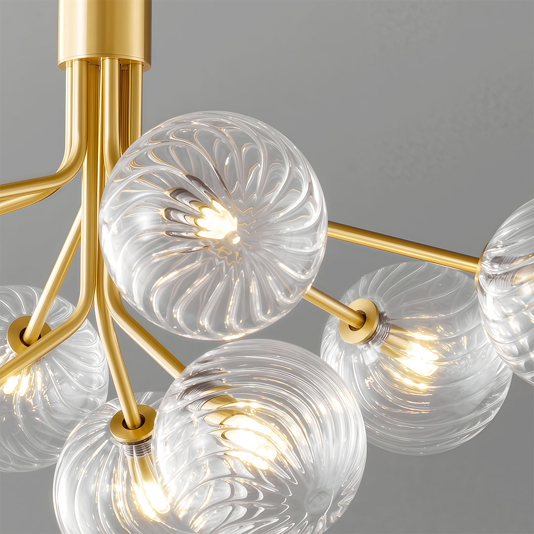 Luxury modern chandeliers with glass spheres, adding a touch of elegance to a stylish dining room.