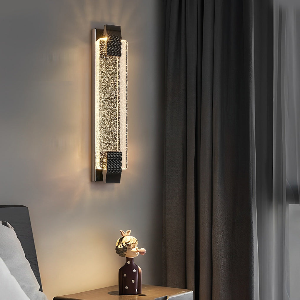 Luxury modern wall lights with gold accents, casting a sophisticated light in a modern living room.