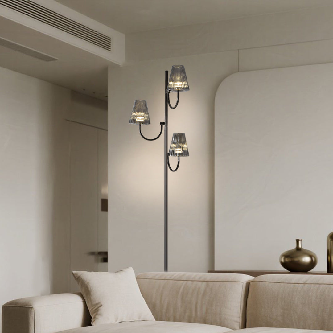 Luxury residential lighting featuring artistic floor lamp with ribbed glass elements in elegant setting