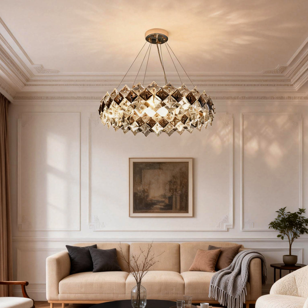 Luxury ring chandelier light providing soft illumination above a stylish sofa setup.