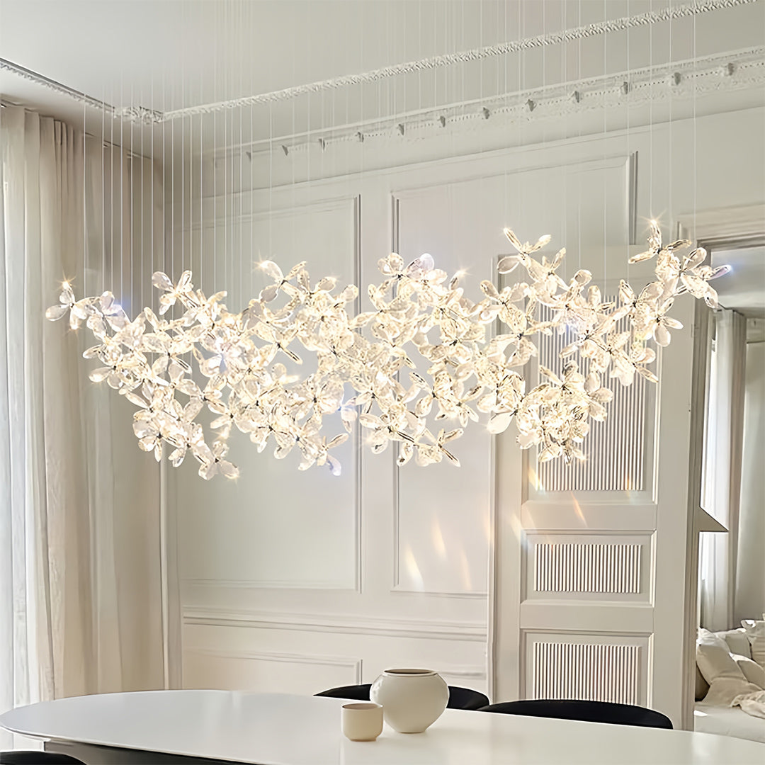 Luxury rock crystal chandelier with sculptural form providing statement lighting in elegant room