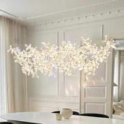 Luxury rock crystal chandelier with sculptural form providing statement lighting in elegant room