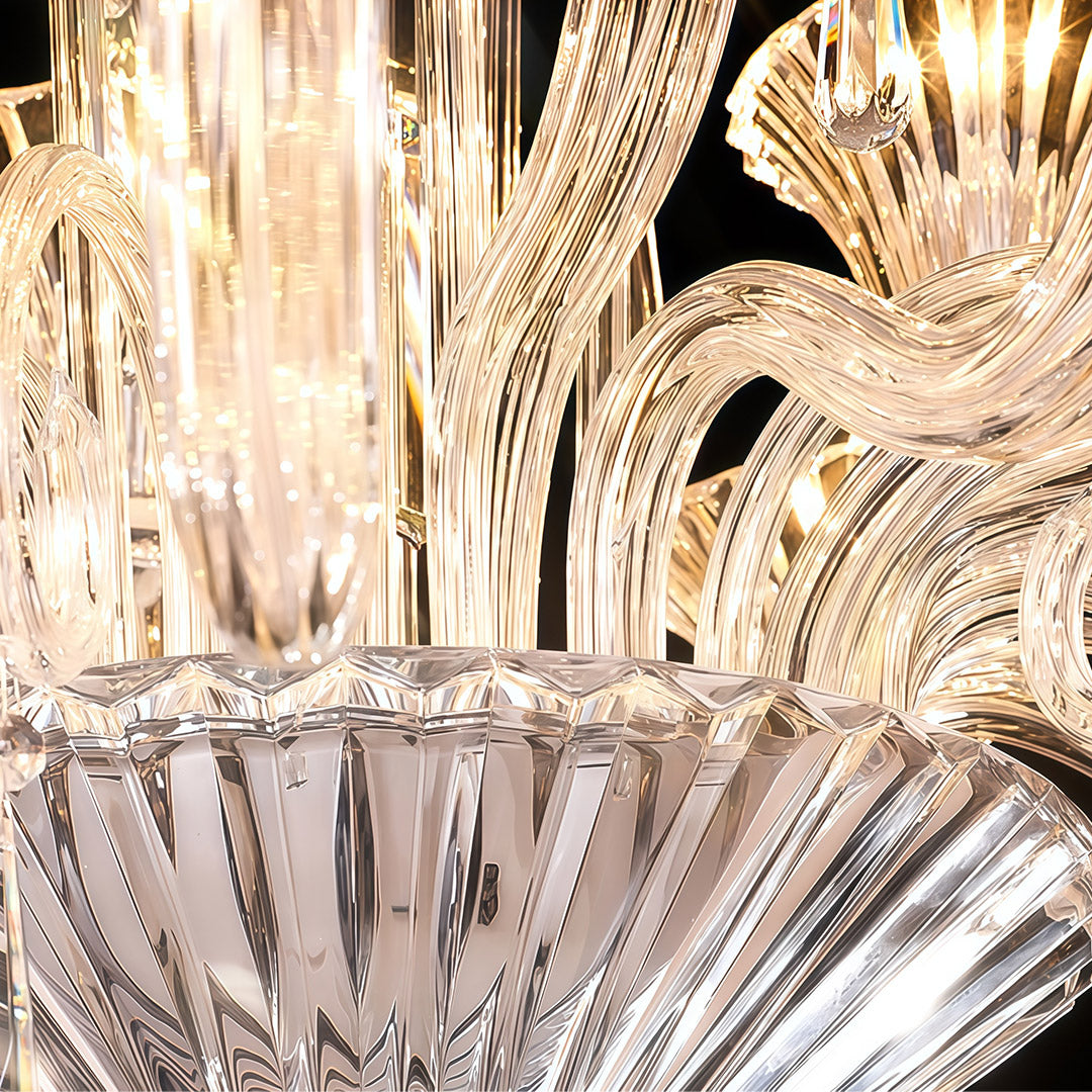 Macro shot of art glass chandelier showing faceted crystal beads and transparent glass elements.