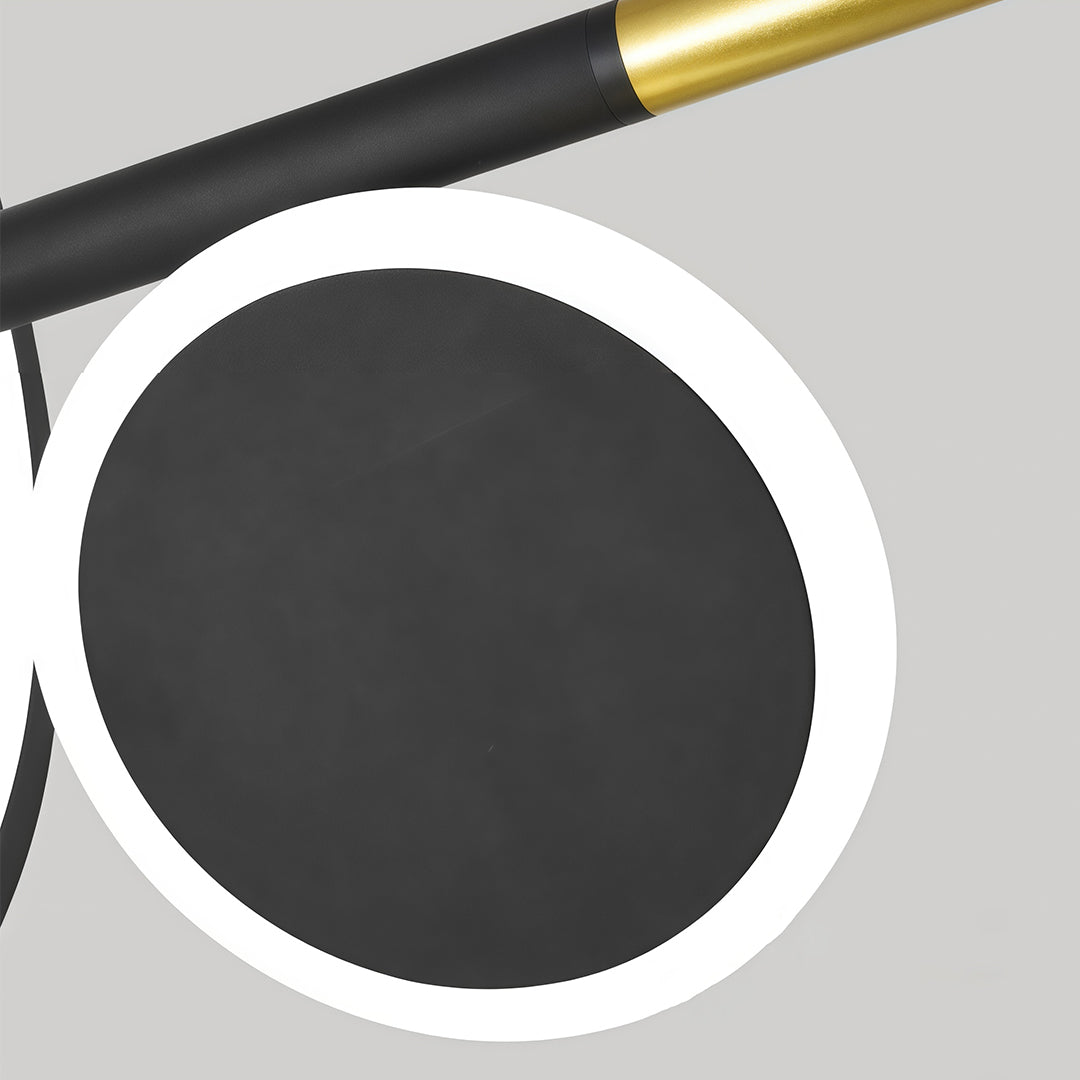 Macro shot highlighting the black metal disc and gold accent details of the 6 light chandelier design.