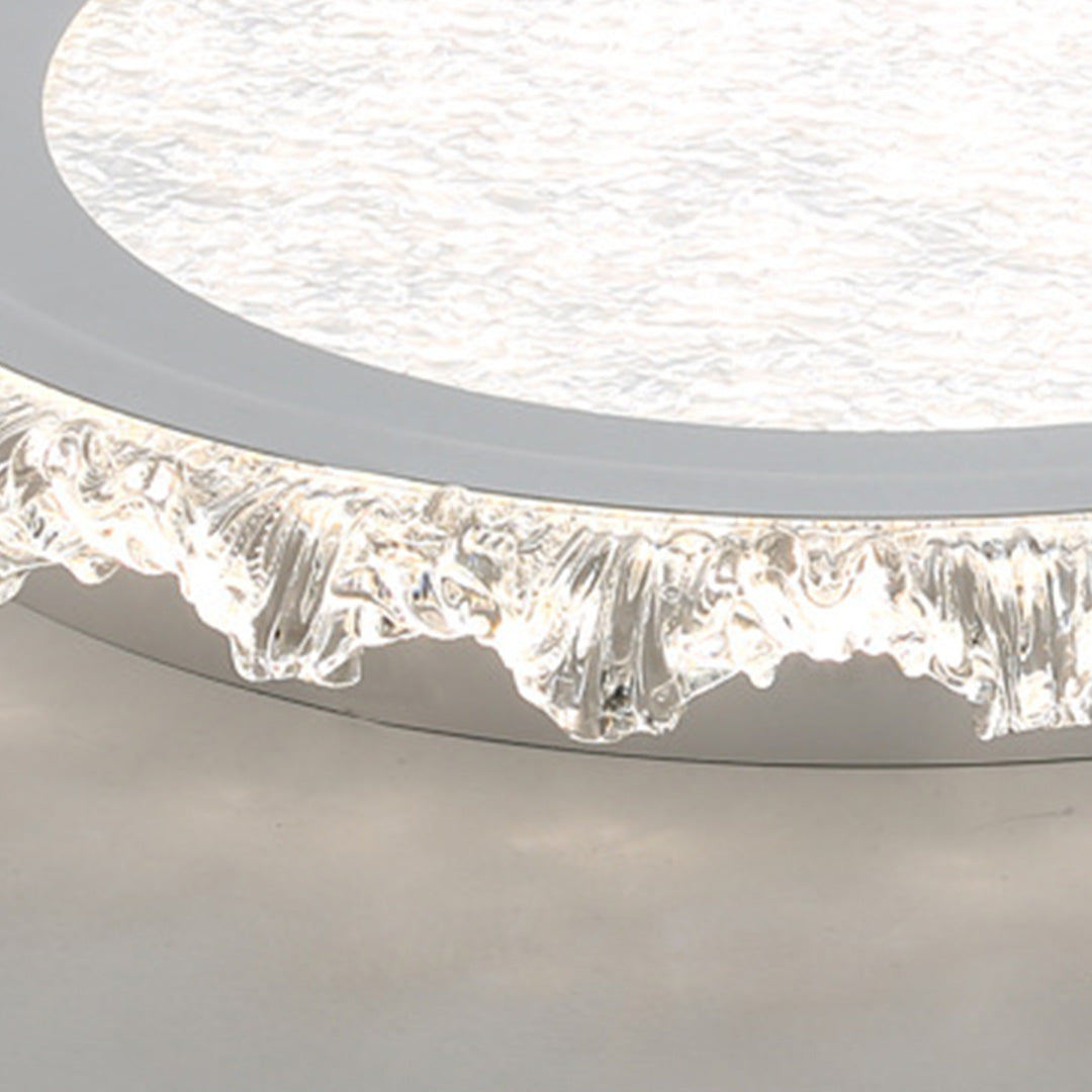 Macro detail of the white round led ceiling light showing the rippled clear acrylic edge frame.