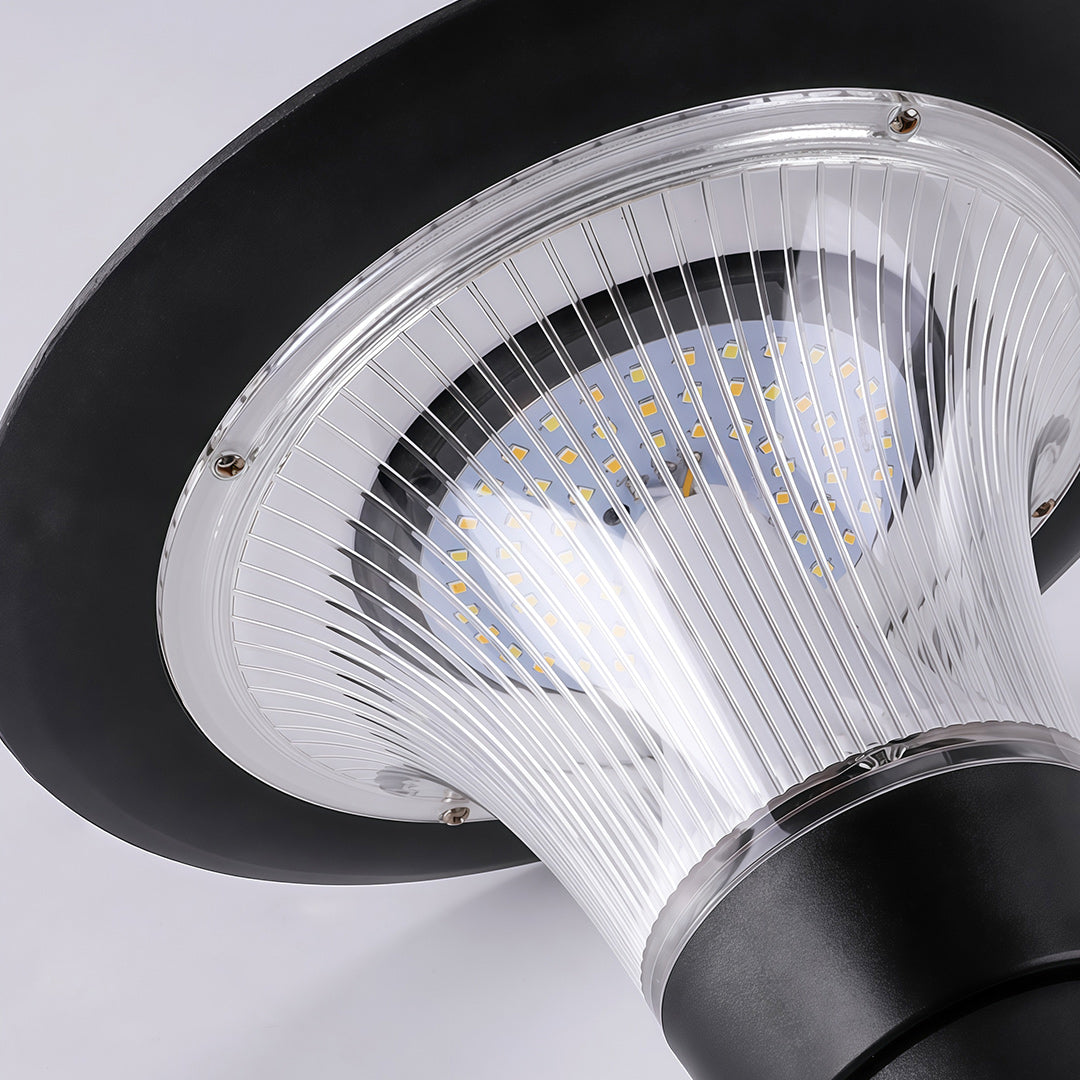 Macro view showing the internal LED components inside the outdoor solar wall sconce diffuser.