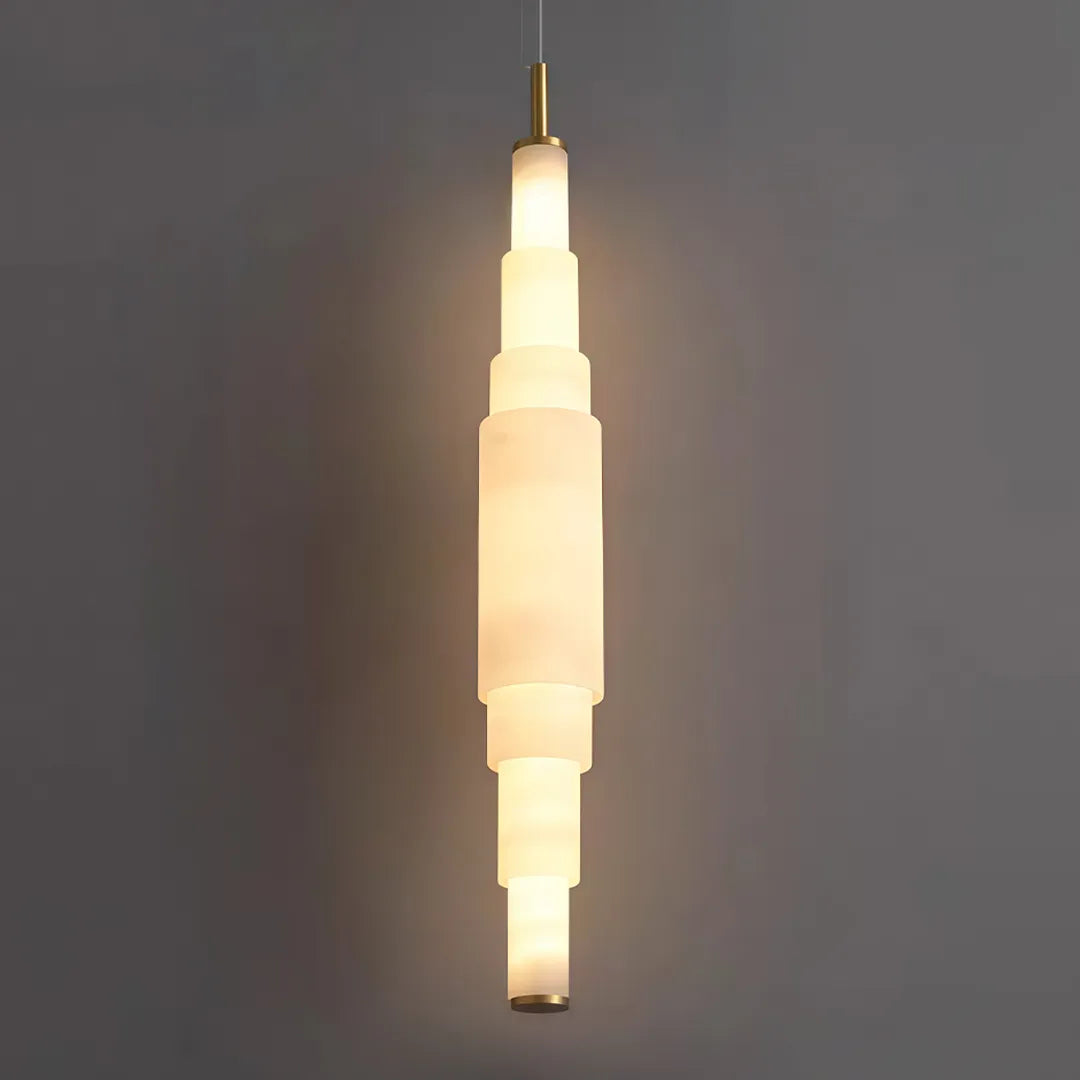 Marble chandelier product detail showing the layered glowing stone design and warm illumination.