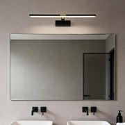 Master bathroom vanity lights installed above a modern rectangular mirror.