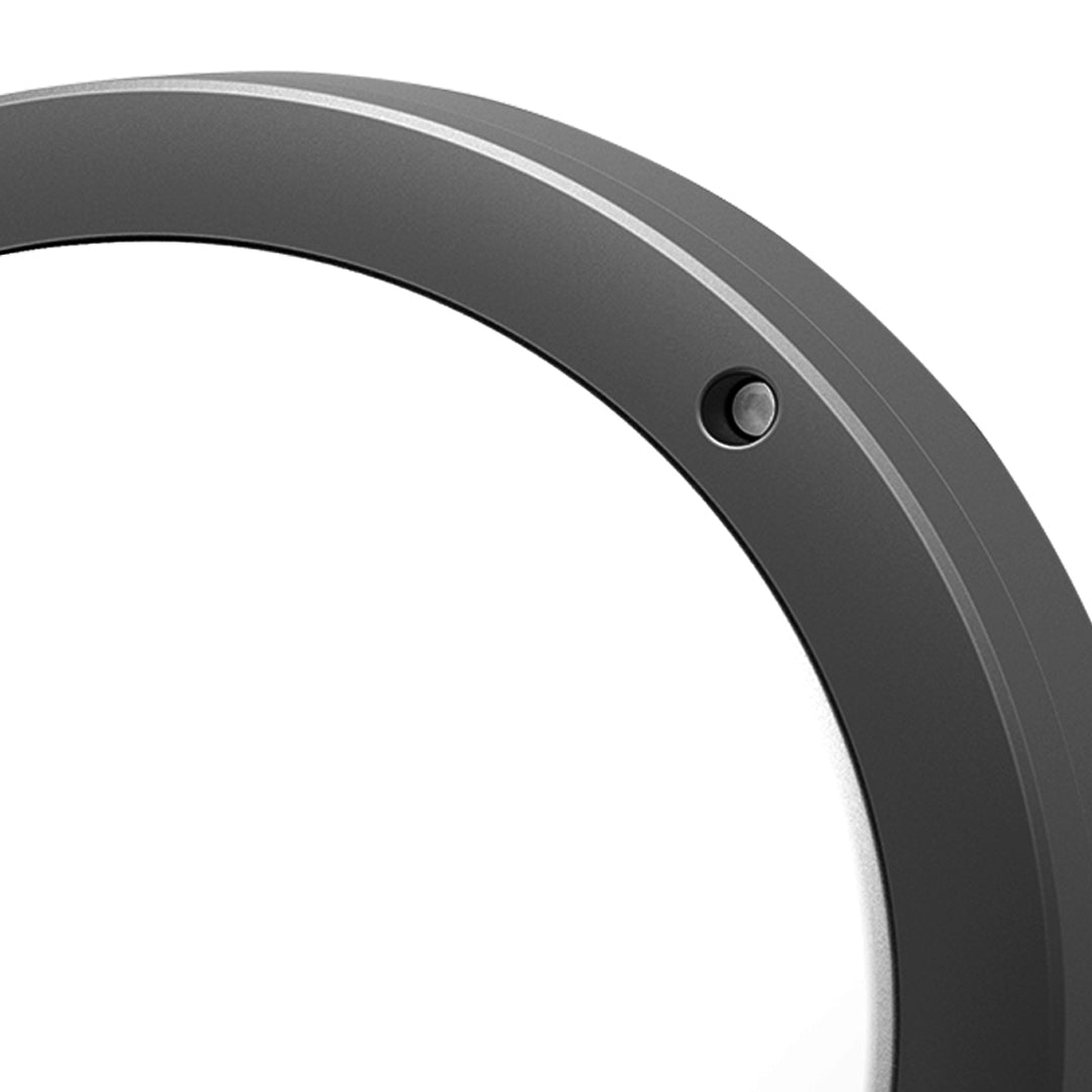 Macro view highlighting the smooth matte black curve and pre-drilled mounting hole of the round outdoor wall lights casing.