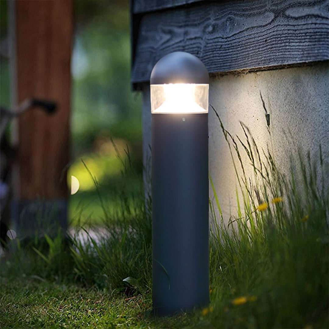 Simple cylindrical bollard with matte finish for minimalist landscape lighting