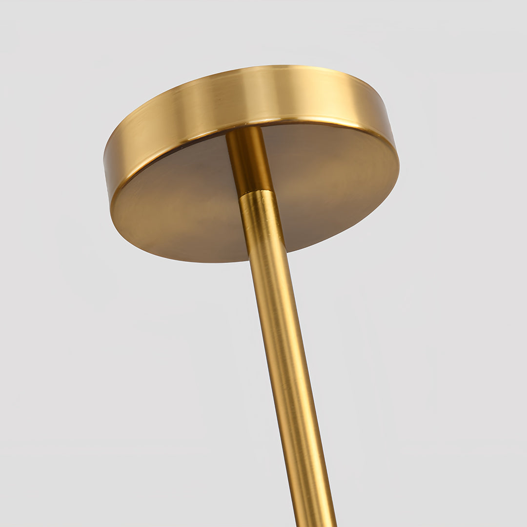 Upward view of the matte gold brass downrod and canopy supporting a 3 tier chandelier light structure.