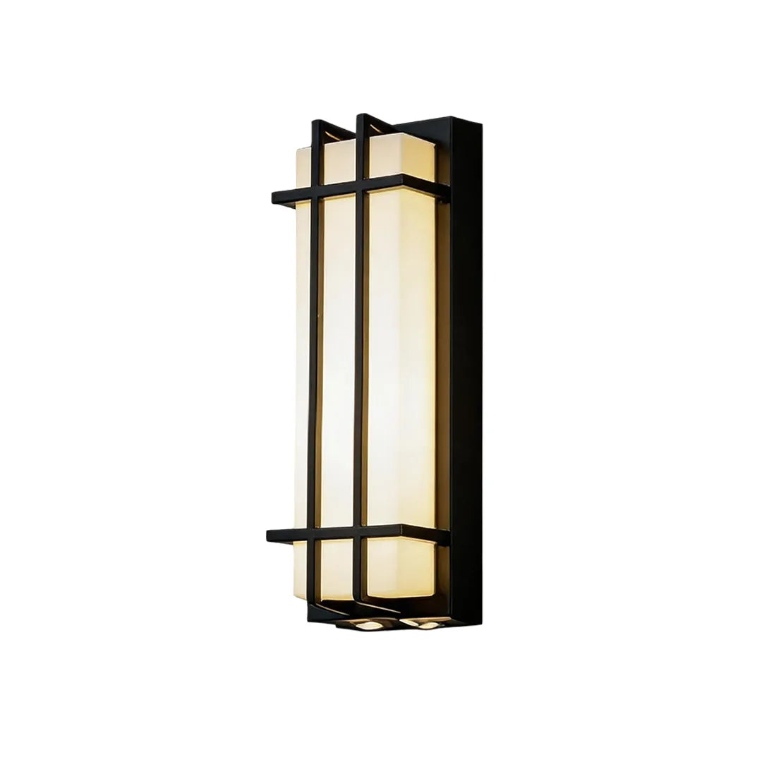 Medium outdoor wall sconce with black grid frame and warm frosted glass