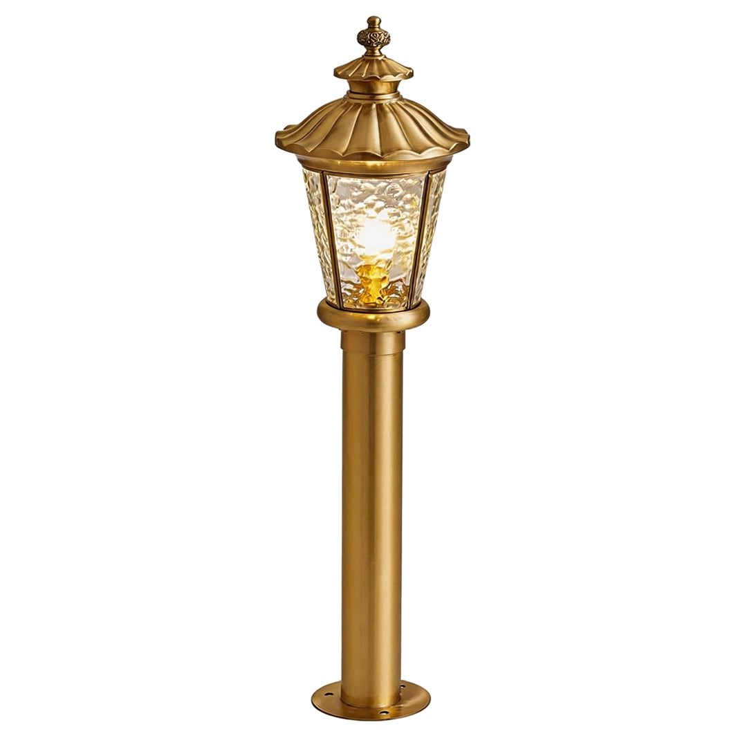 Medium vintage brass pathway light with warm glow and classic lantern design