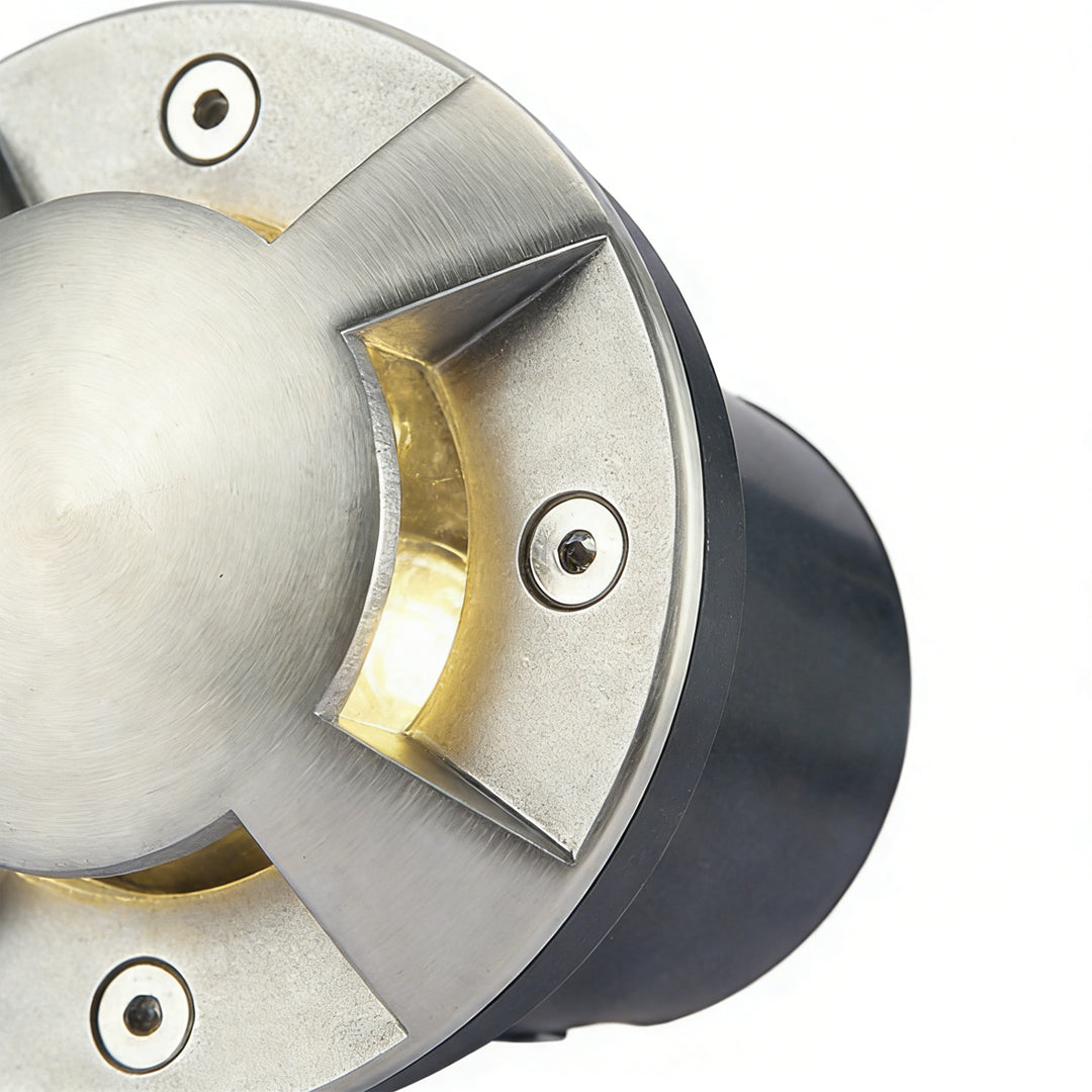 Metal deck lights with close-up of sleek design and warm light output.