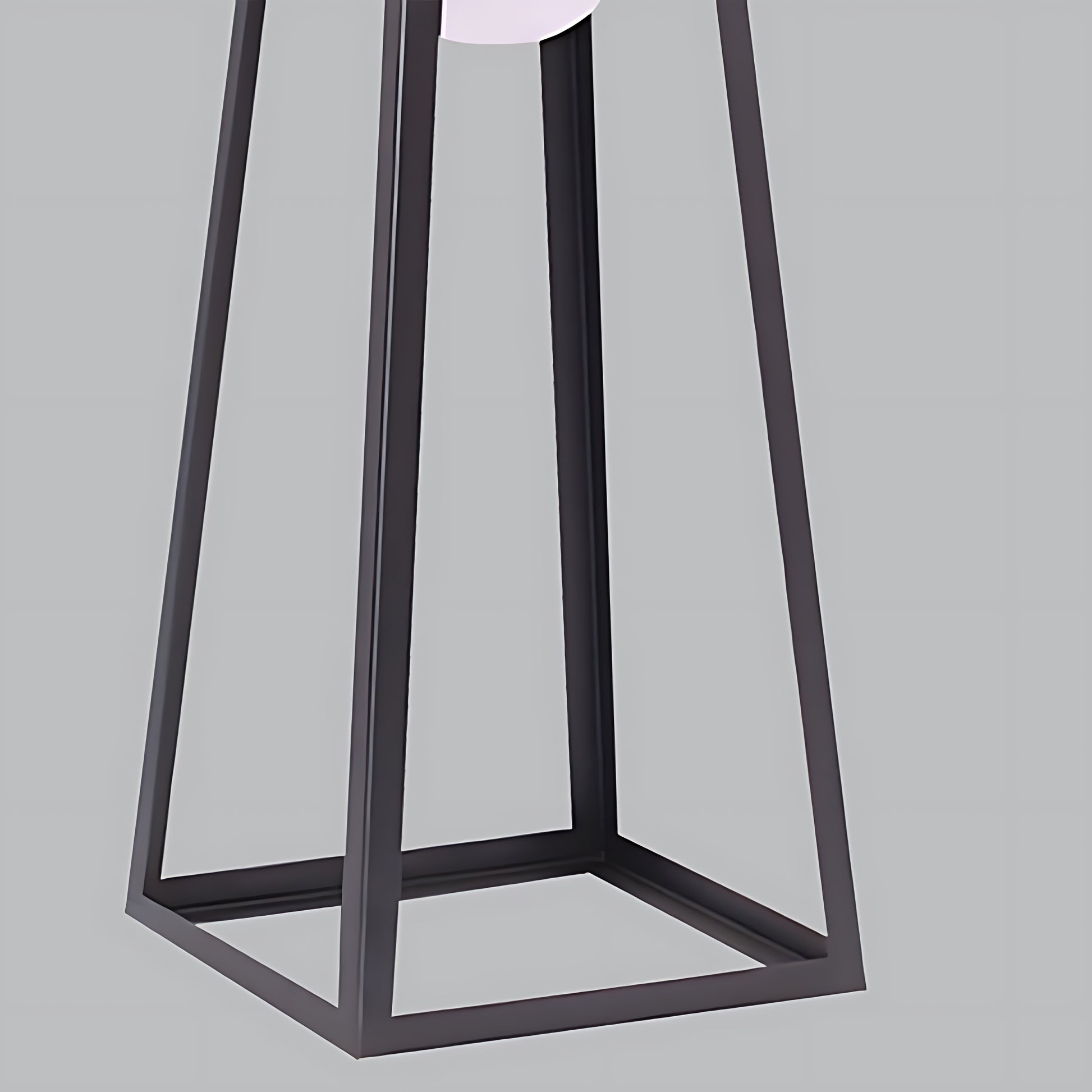 Black metal lantern frame shown without illumination displaying clean geometric construction lines