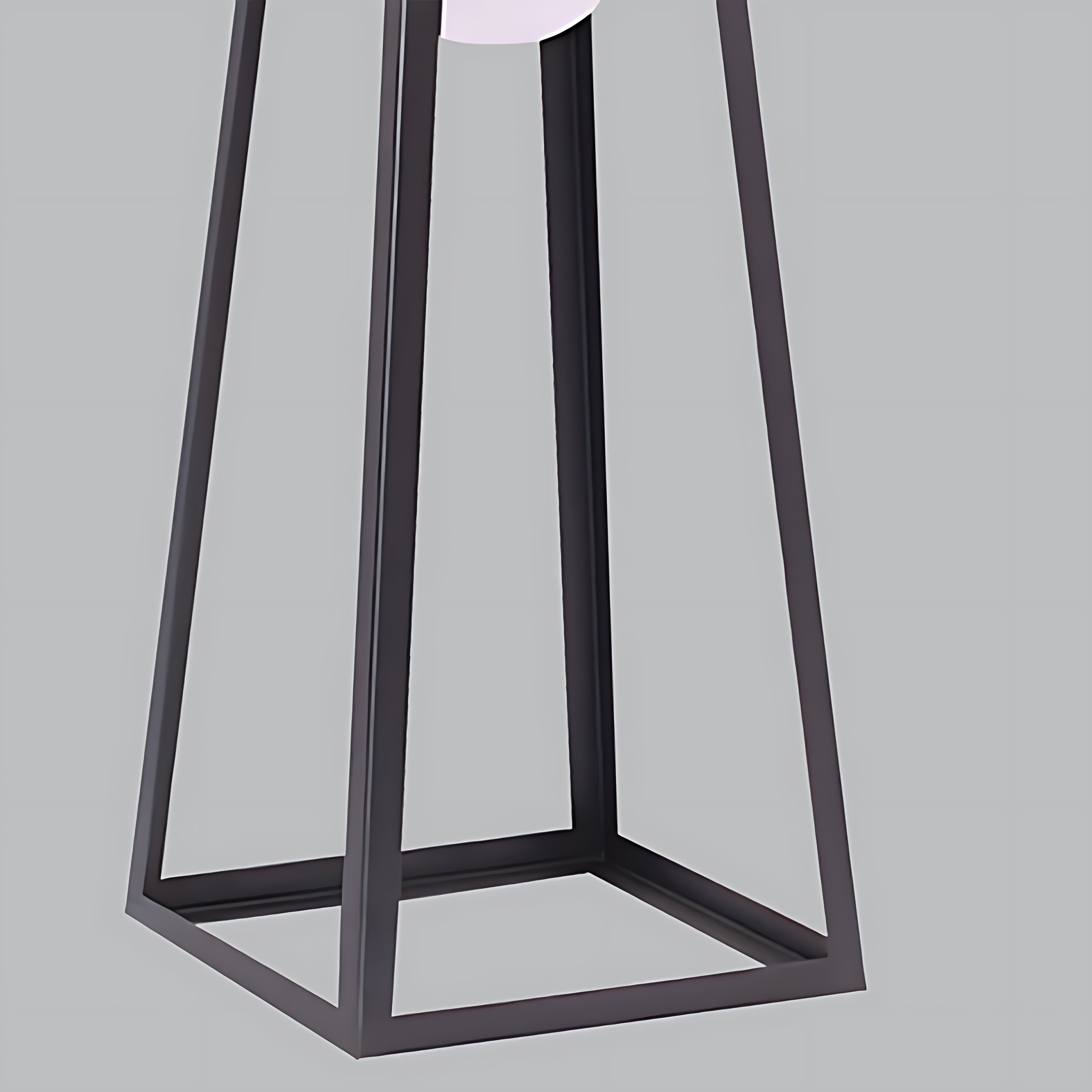 Black metal lantern frame shown without illumination displaying clean geometric construction lines