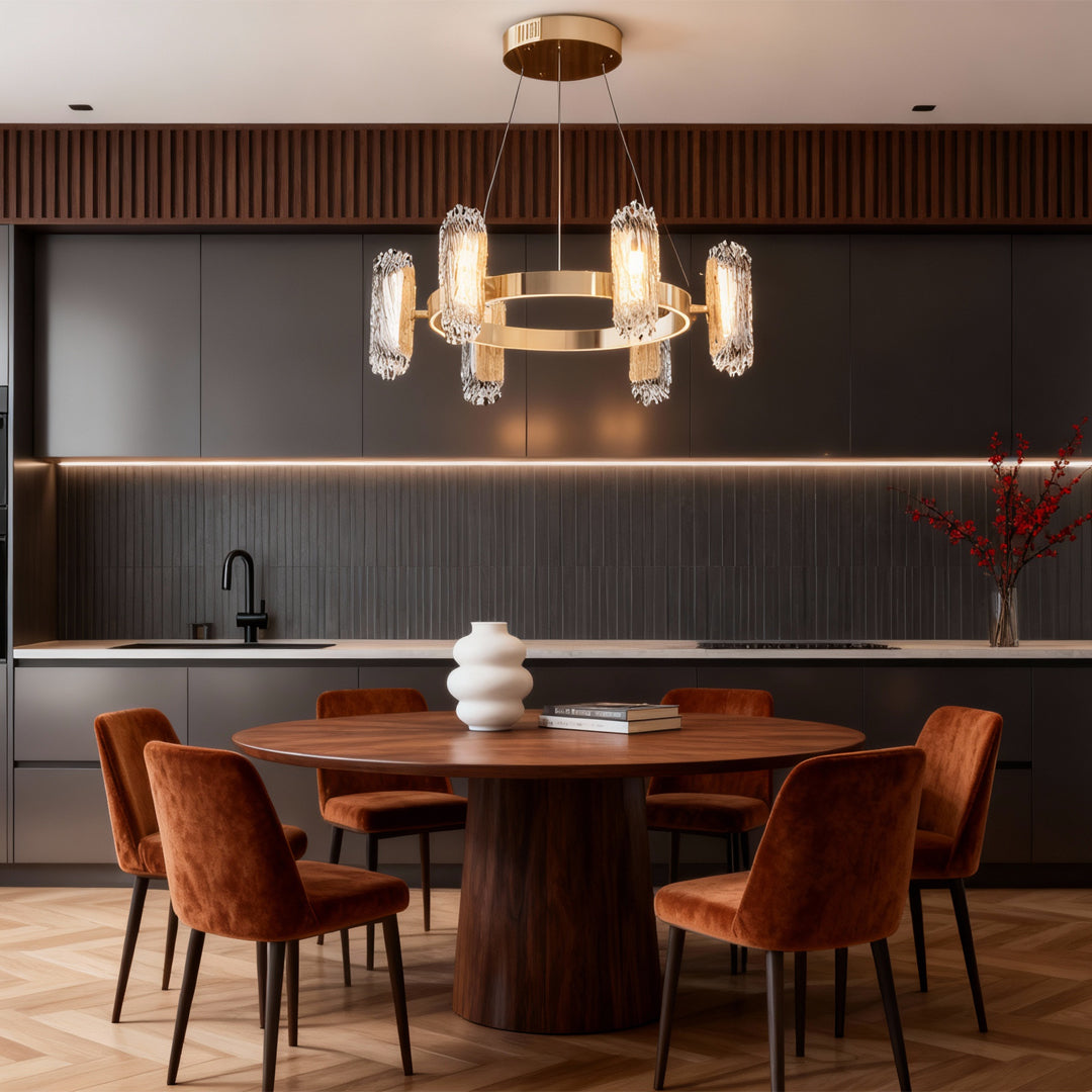 Metal modern chandelier illuminating contemporary dining room with circular design over round wood table