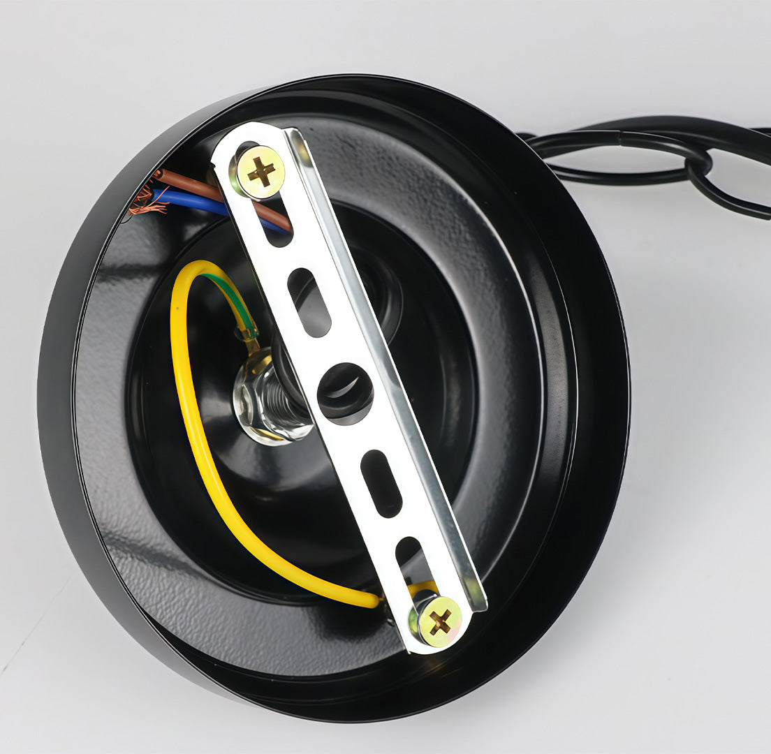 Gold-toned metal orb pendant light hanging alone, showcasing its classic lantern-inspired outdoor design.