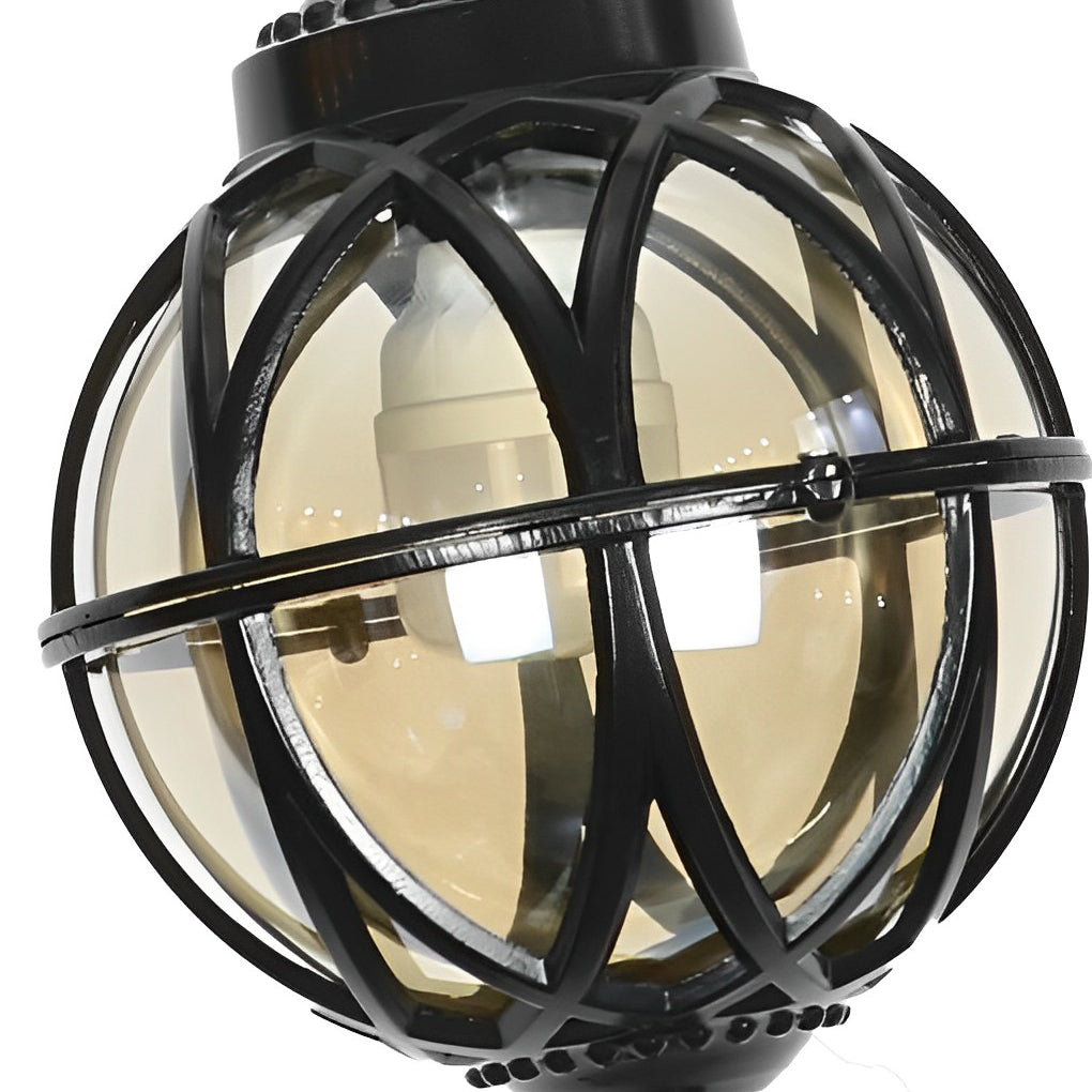 Product close-up of a metal orb pendant light showing the curved metal frame and inner glass globe.