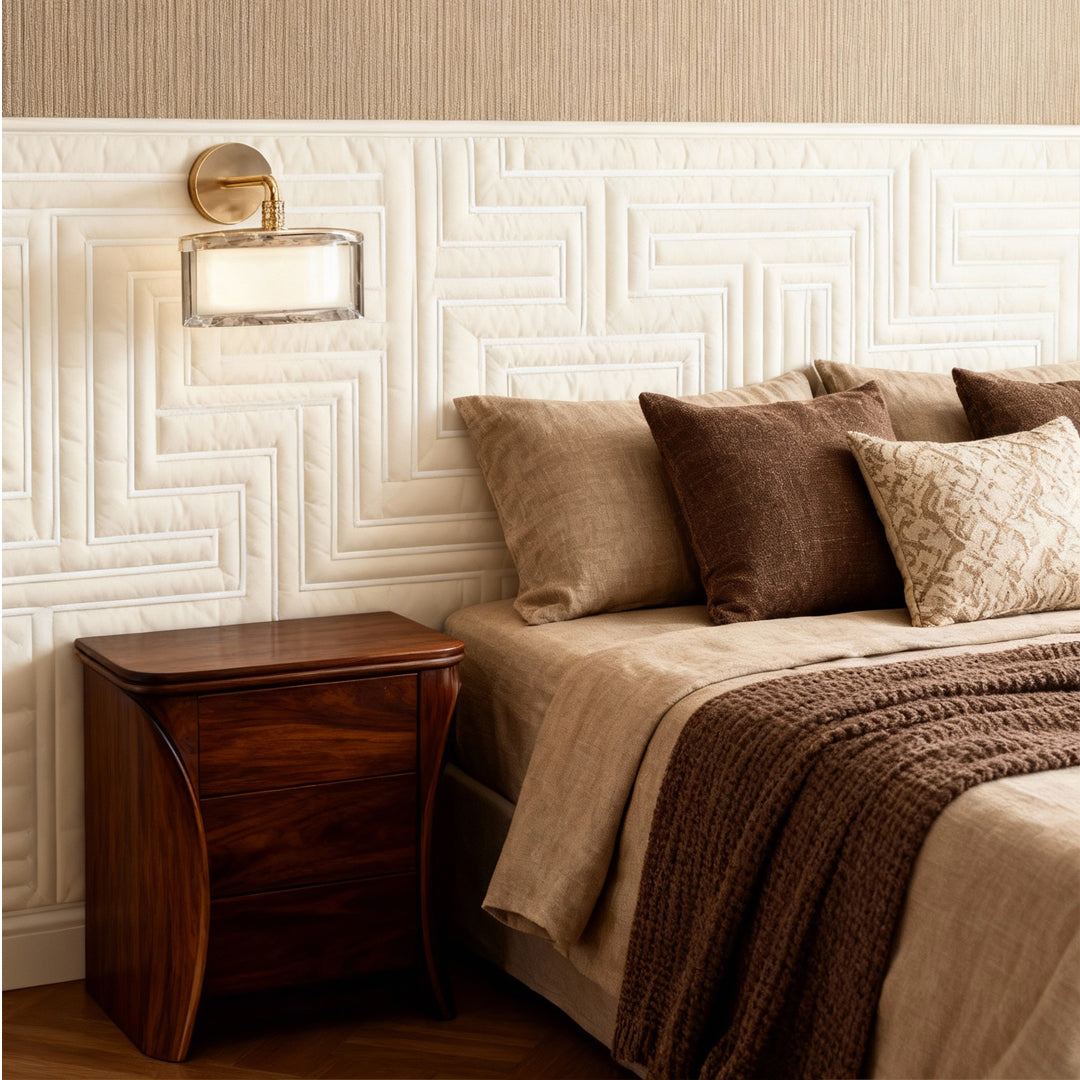 Metal wall art with led lights providing bedside illumination in contemporary bedroom with textured wallpaper and brown linens