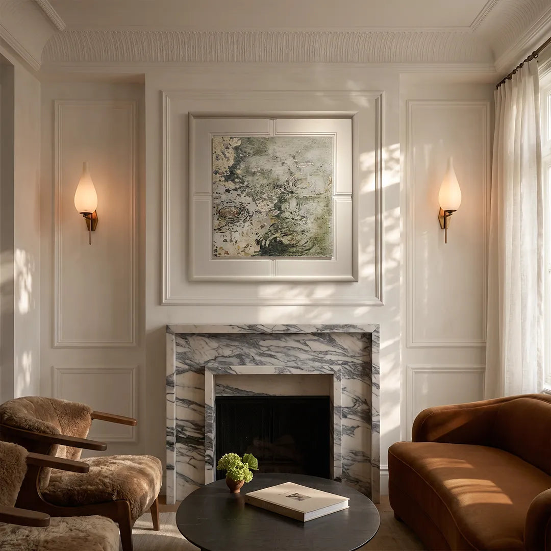 Mid century modern wall light pair flanking a fireplace in an elegant classic living room.