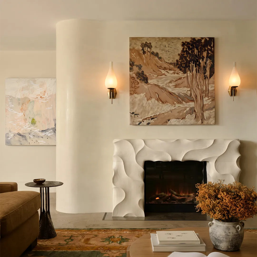 Mid century modern wall light pair mounted beside a fireplace in a cozy living room.