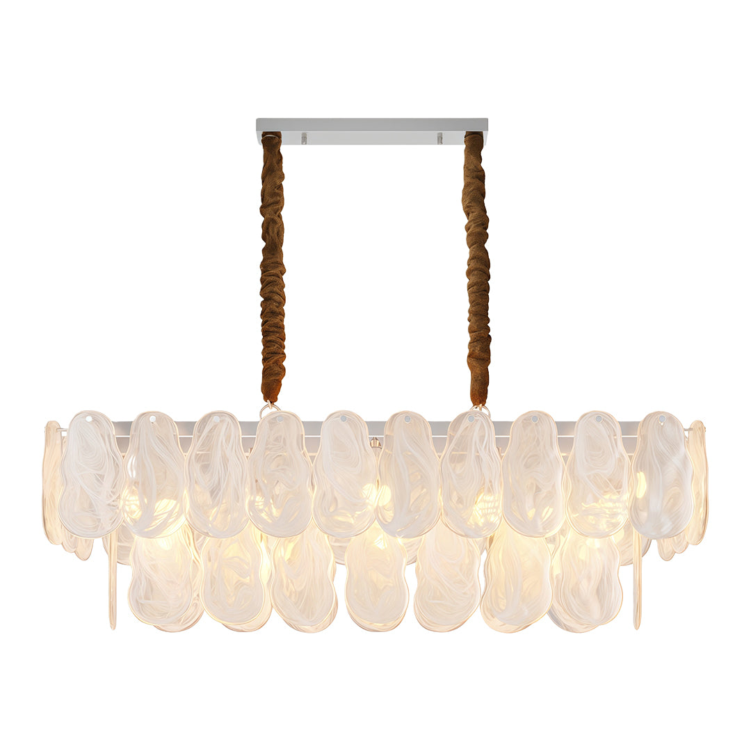 Luxury midcentury modern chandeliers creating focal point in open-concept living and dining area.