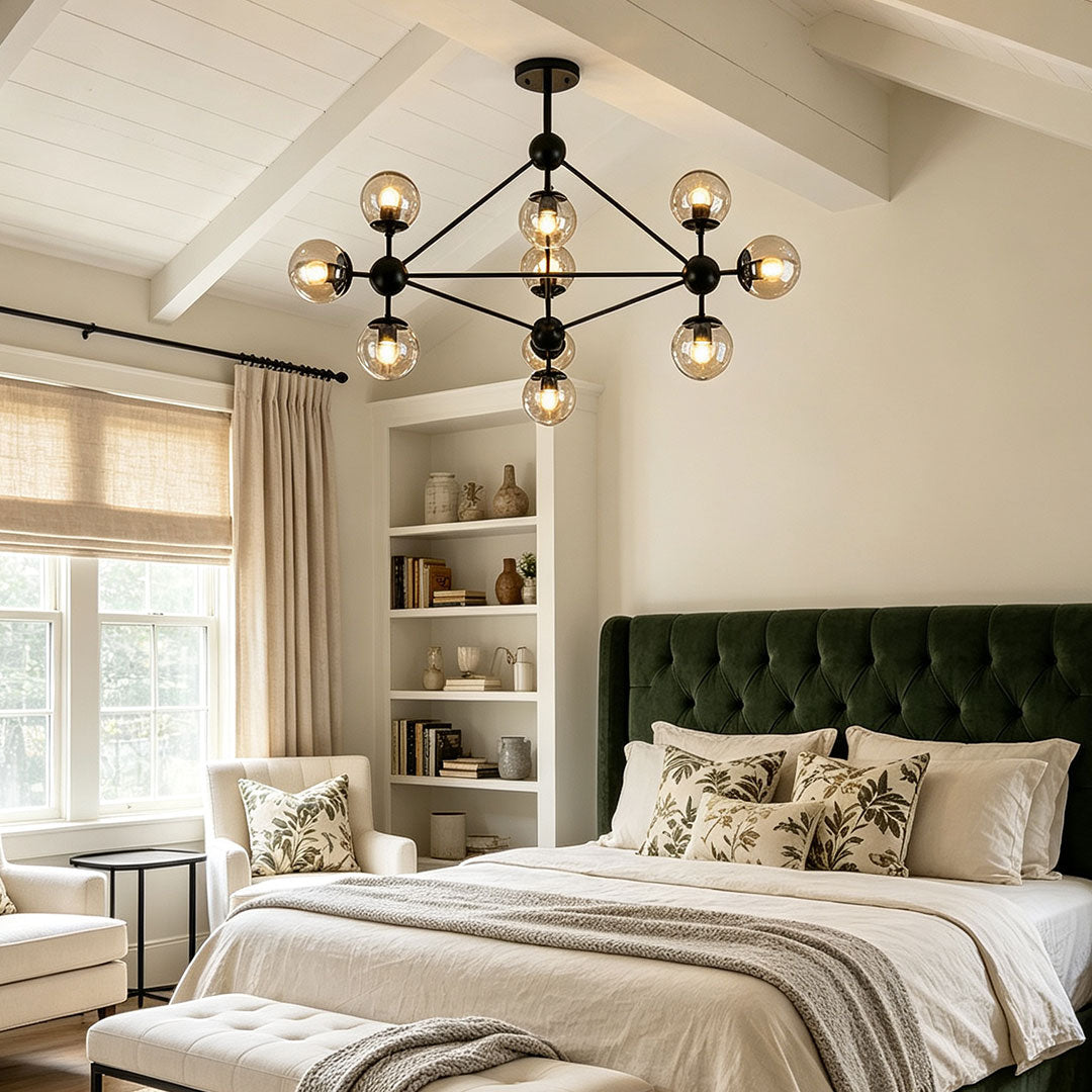 Midcentury modern chandeliers installed in a cozy bedroom with warm contemporary lighting design.