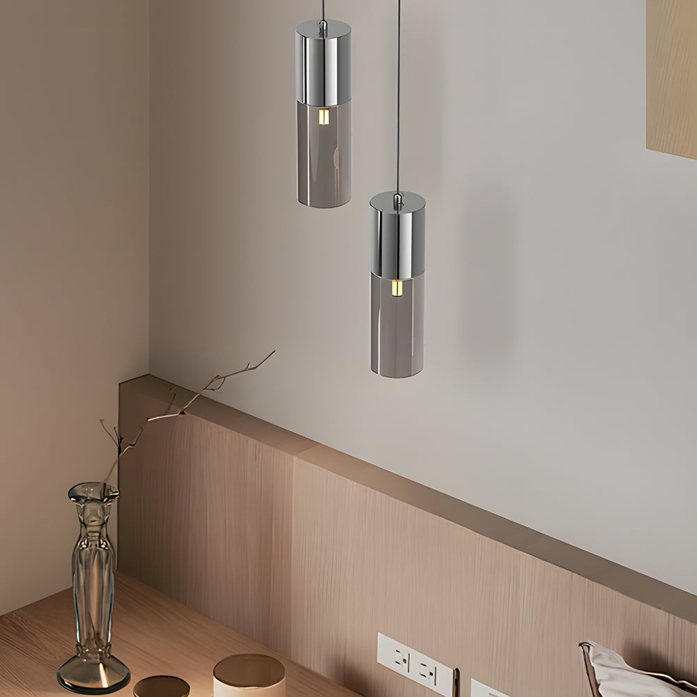 Mini black pendant lights hanging over a staircase landing