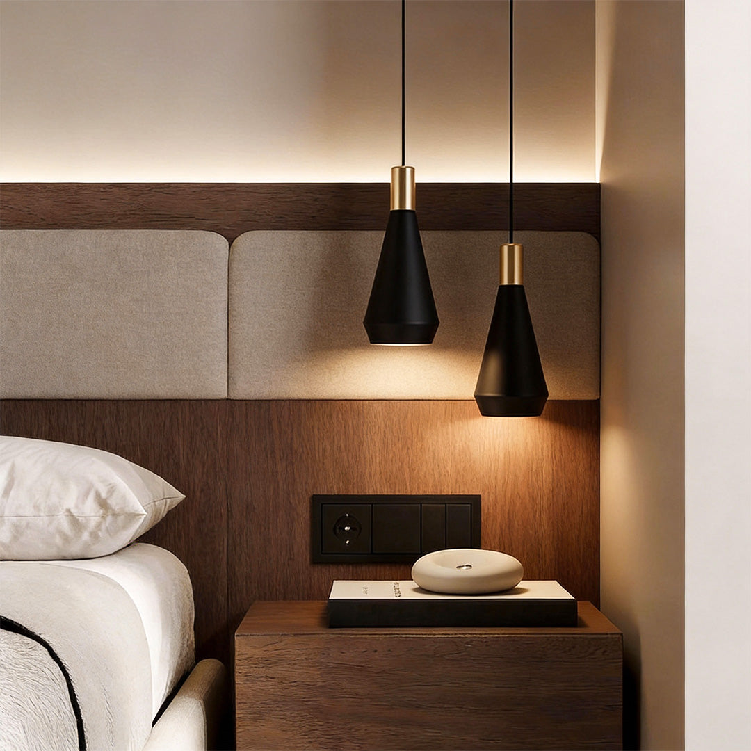 Mini hanging pendant lights used as bedside lighting, providing focused illumination and a cozy atmosphere in a modern bedroom.