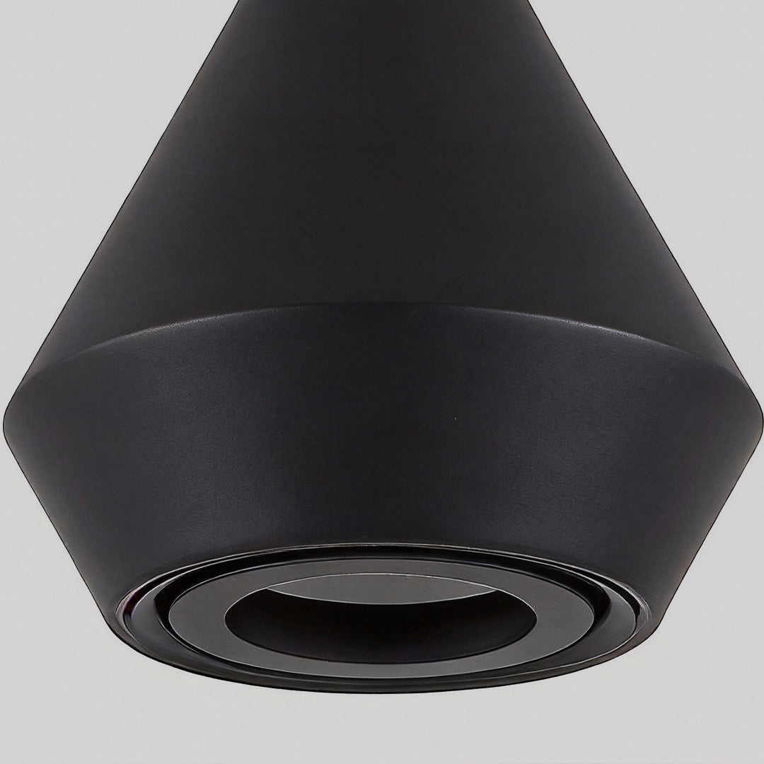 Close-up view of a black mini hanging pendant lights fixture, highlighting the refined shape and downward light opening.