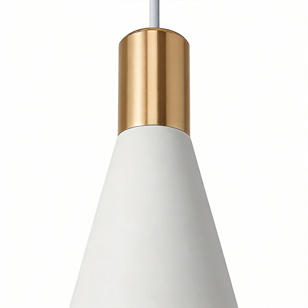 Close-up of a white mini hanging pendant lights fixture with brass detail, showcasing smooth finish and modern craftsmanship.