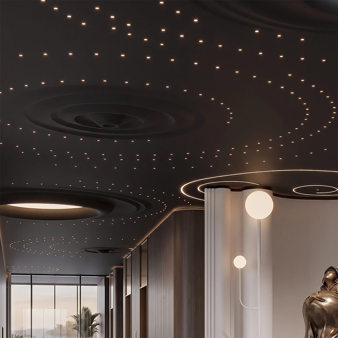 Mini LED spotlight creating a starry ceiling effect in a modern interior with pendant lights.