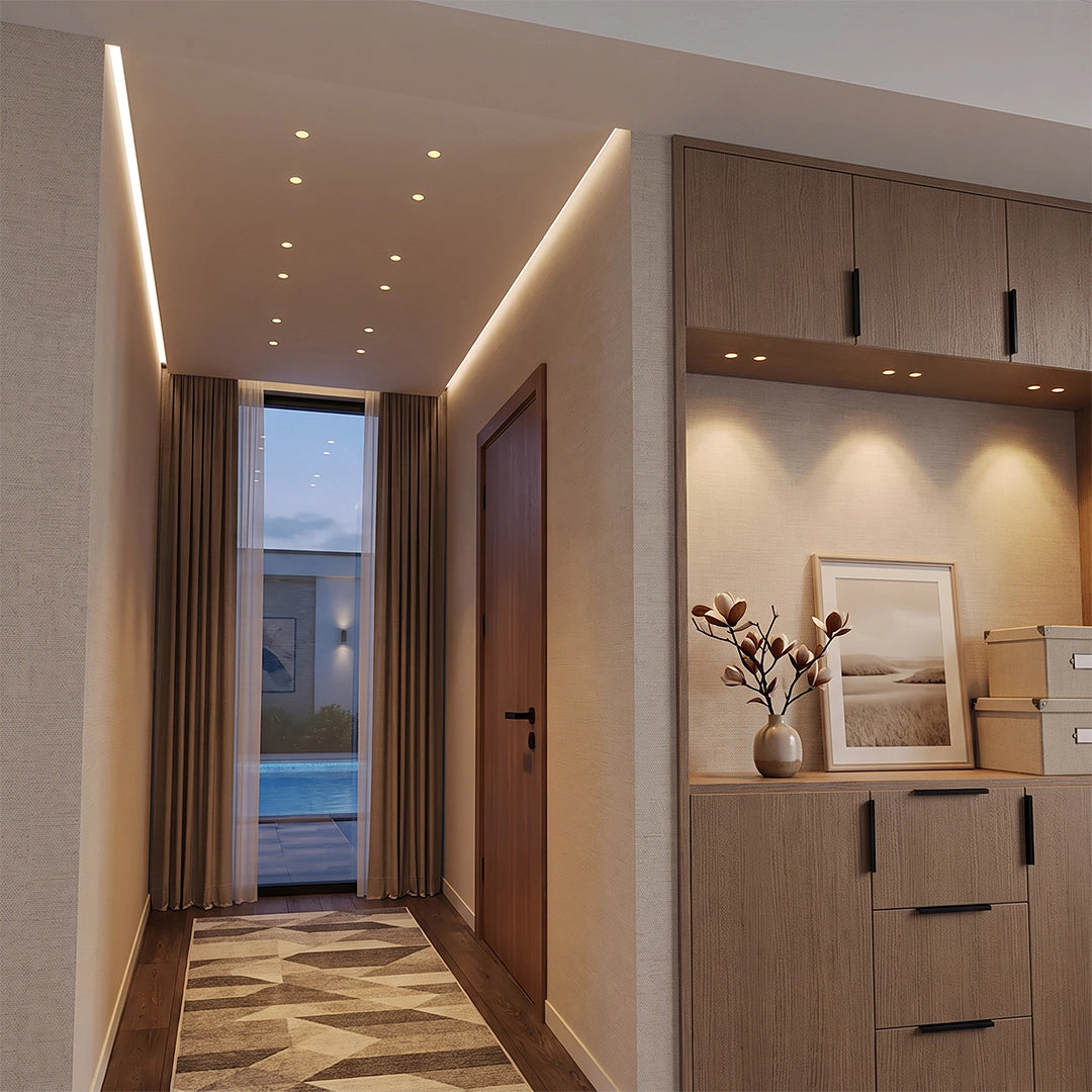 Mini LED spotlight lining a modern hallway ceiling with recessed lighting and wood cabinetry.