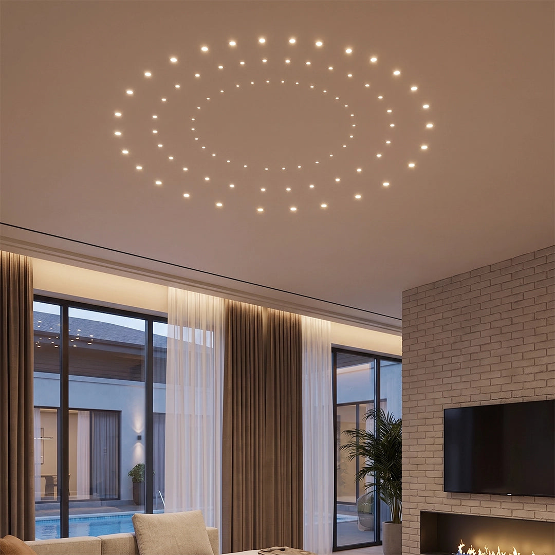 Mini LED spotlight arranged in circular patterns on a modern living room ceiling.