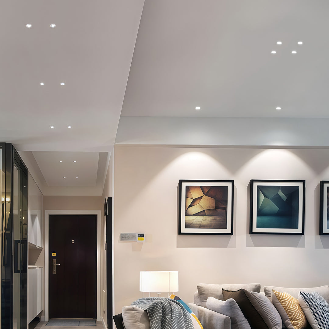Mini LED spotlights creating starlight effect in modern bedroom with grey walls and artwork