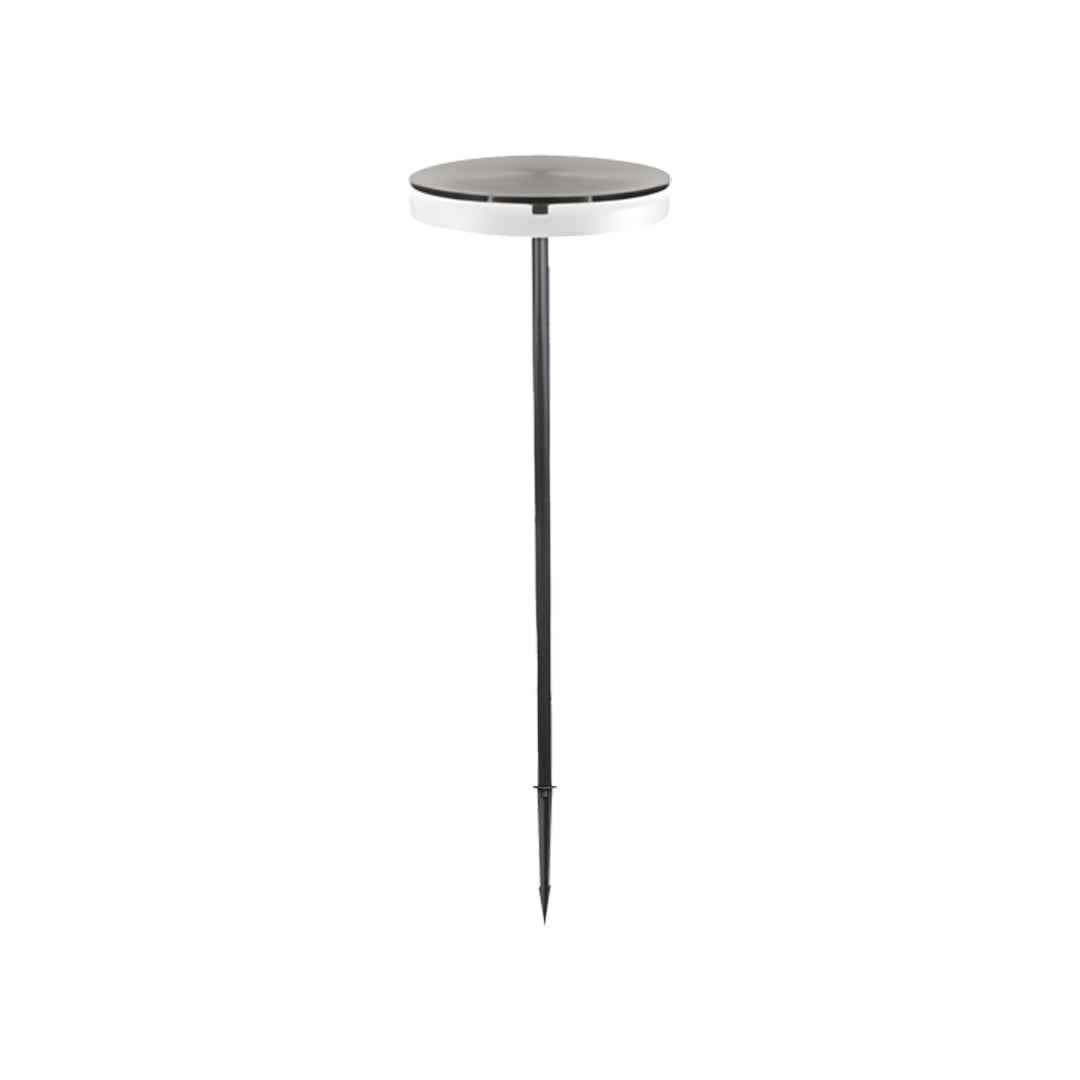 Minimal cylindrical path light with long stem providing focused outdoor lighting path illumination.