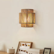 Japanese wall sconce light installed in minimalist bedroom providing gentle ambient illumination