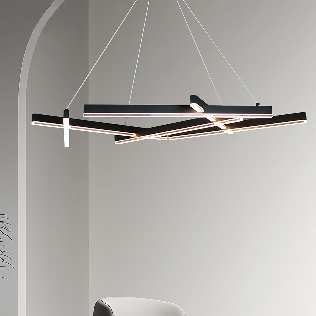 Minimalist bedroom featuring small black pendant light as striking geometric focal point