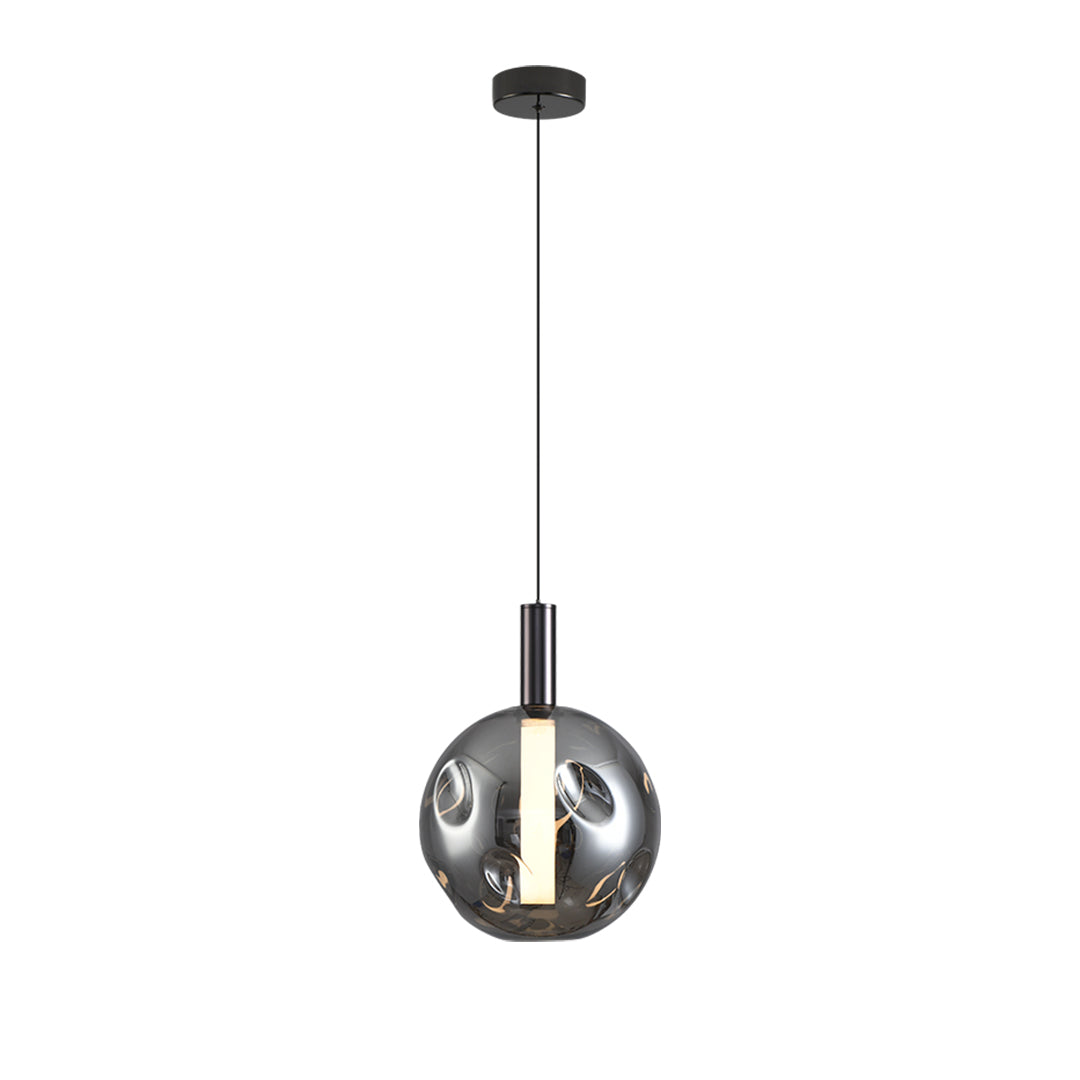 Minimalist drum pendant lights suspended with black cord against neutral background
