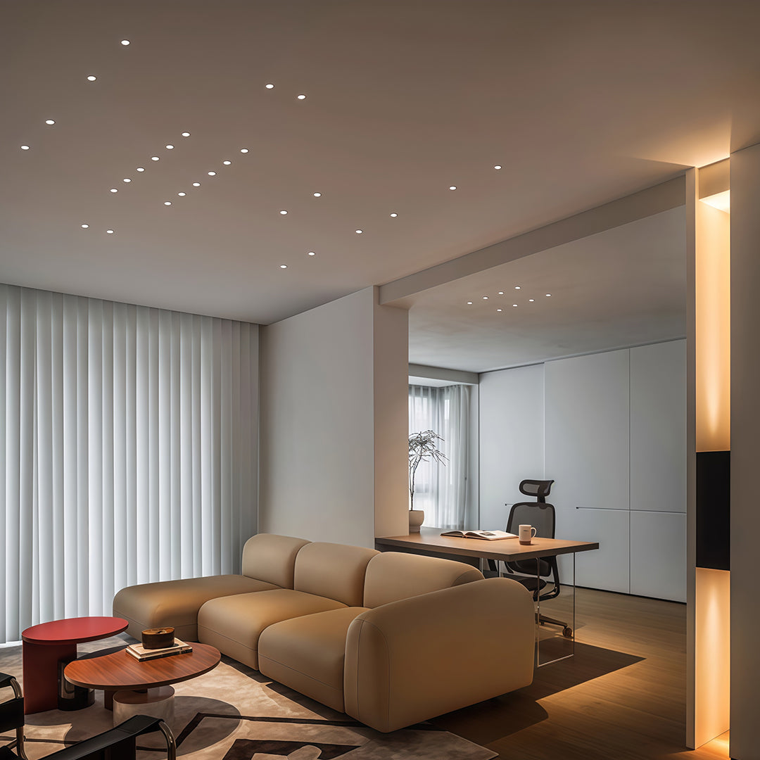 Minimalist black glass shade chandelier downlight with recessed mounting for seamless ceiling integration.